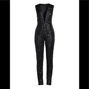 Suit up in this dazzling svelte jumpsuit